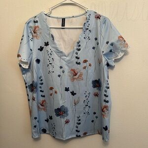 NWOT JustFashionNow Size L short sleeve Blue Flowers shirt